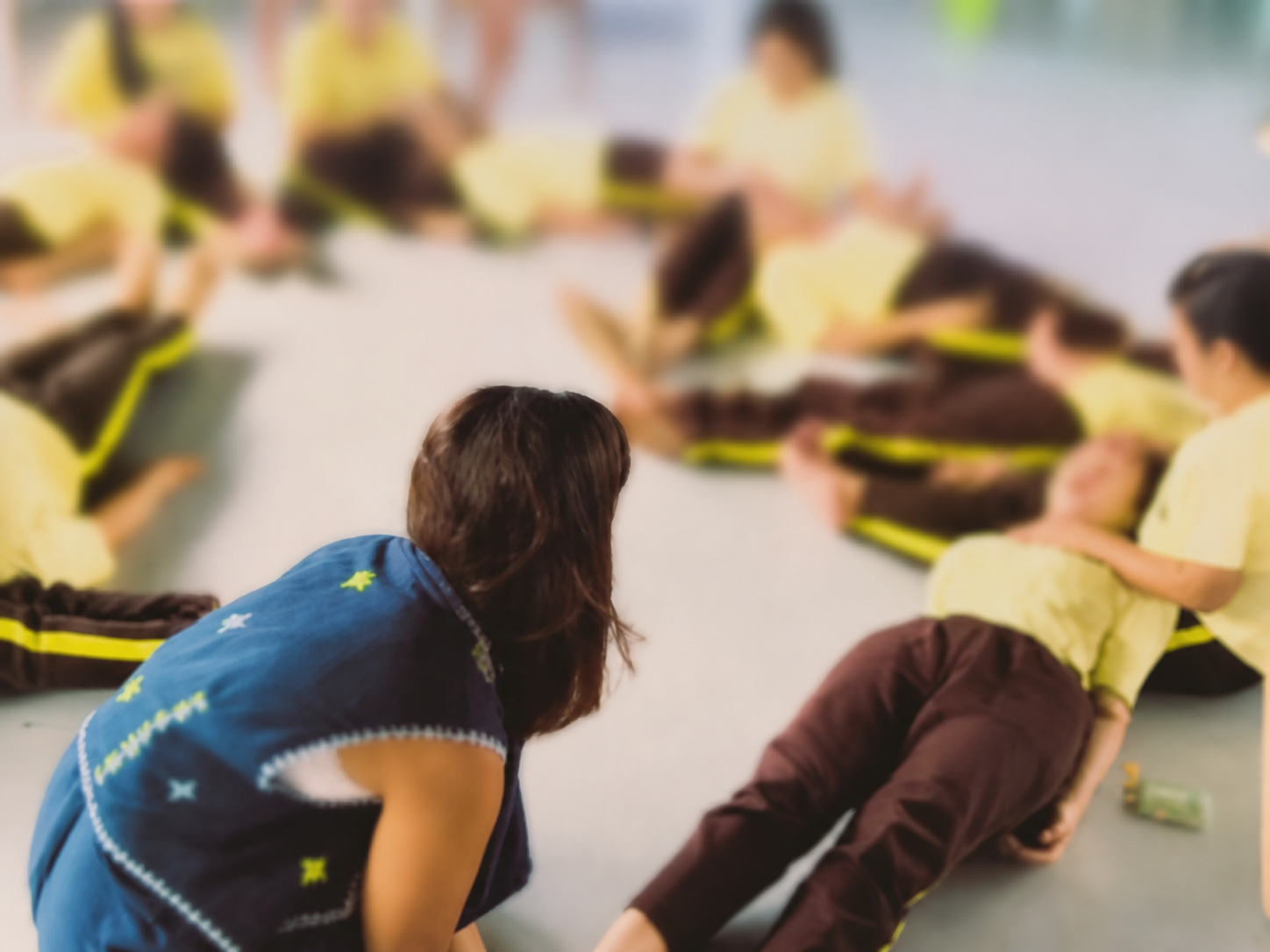 Creative Wellness workshop activity with participants' faces blurred for privacy